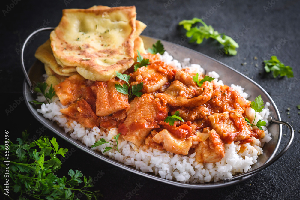 Delicious fish curry with naan bread Delicious fish curry with naan bread