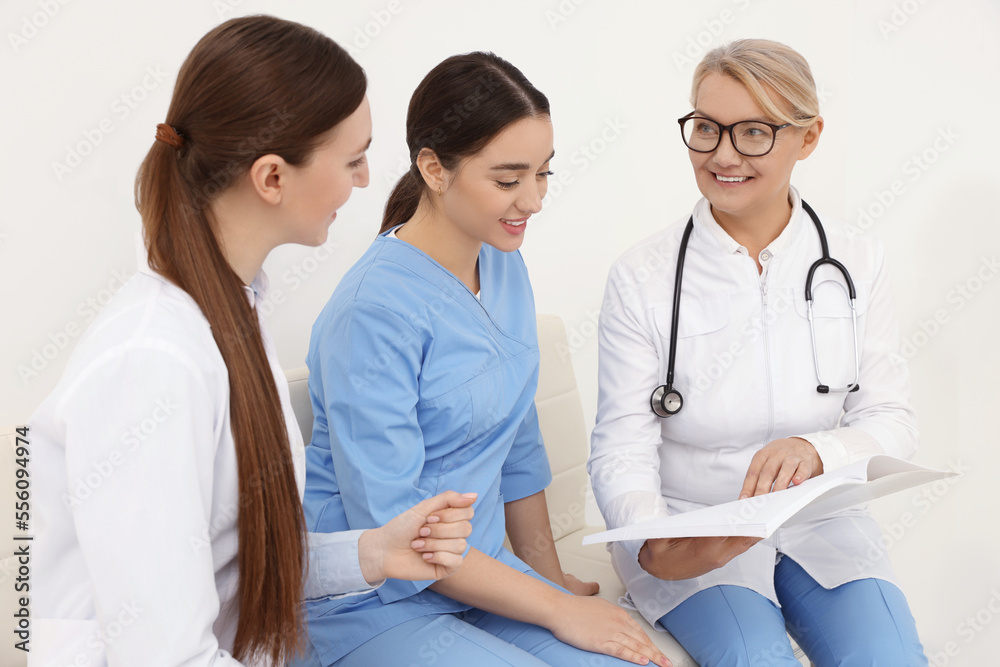 Team of professional doctors working in office Team of professional doctors working in office