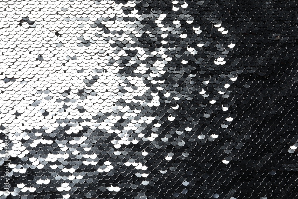 Texture of beautiful bright sequins as background, top view Texture of beautiful bright sequins as background, top view