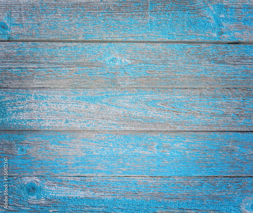 Aged wooden surface with blue paint