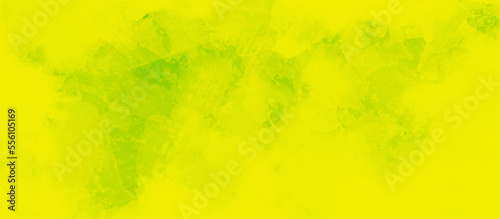Brush-painted yellow watercolor background with watercolor splashes and stains, stylist and stained yellow background for wallpaper, cover, card, decoration and design.