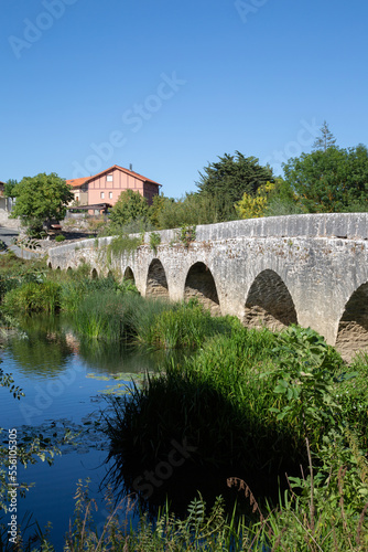 Bridge at Trespuentes with River in Vitoria, Alava Spain photo