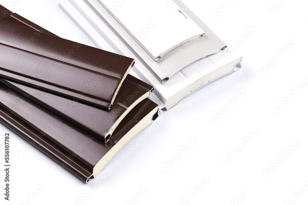 Sandwich panel close-up on white background isolated, material for the construction of garage doors Sandwich panel close-up on white background isolated, material for the construction of garage doors