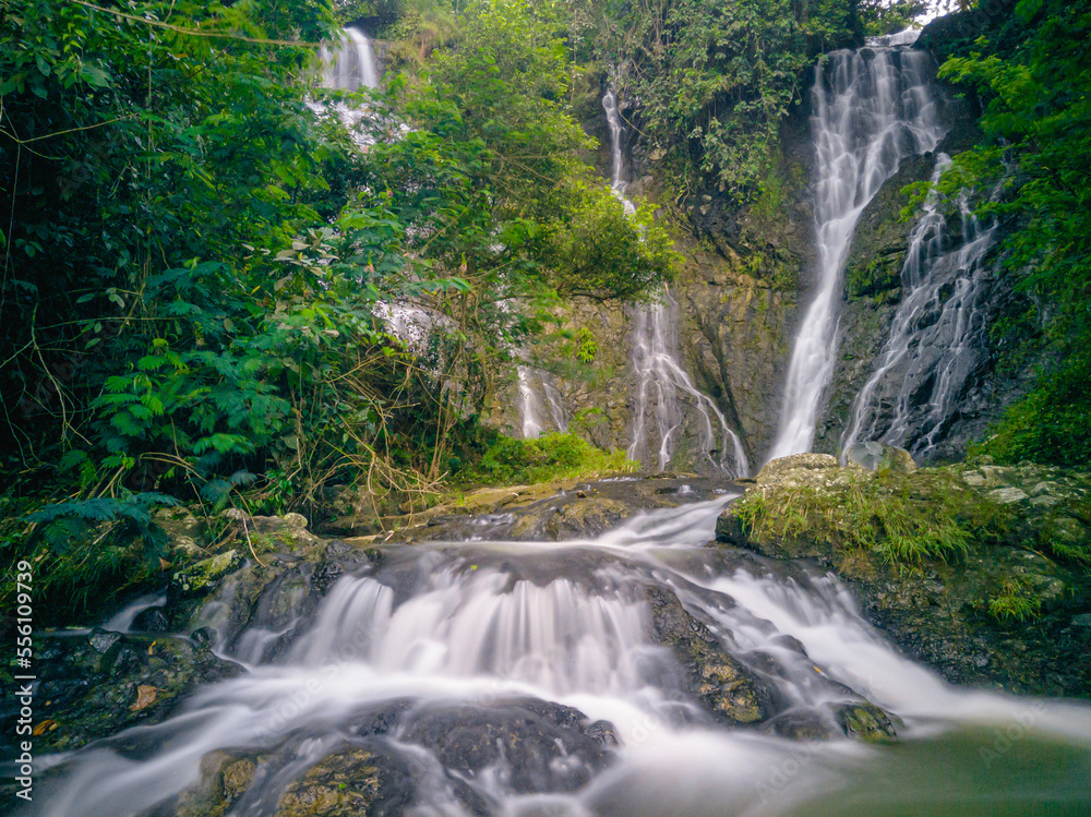 Fototapeta premium Nyandung Waterfall, one of the waterfalls in Kuningan, West Java. This waterfall is still very beautiful so it is very suitable to be a place to unwind from work.