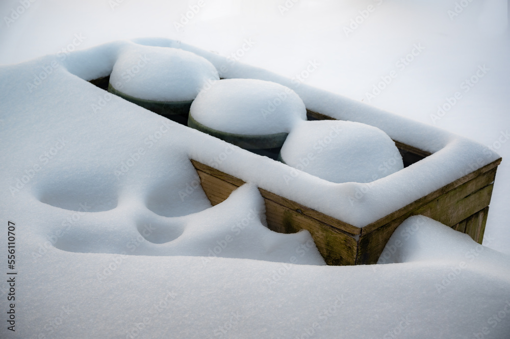 snow drift on wood garden planter snow drift on wood garden planter