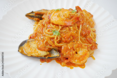 plate of sea food pasta on table 