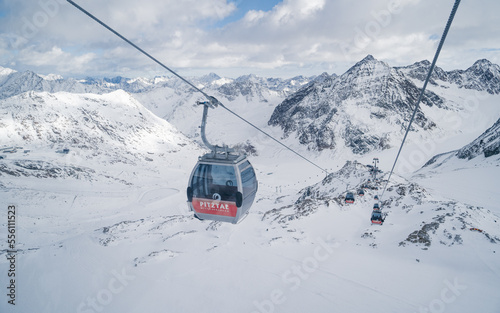 PITZTAL GLACIER, AUSTRIA -  21.12.22:  Gondola cable car and ski slopes in the mountains of Pitztal winter resort, Austrian Alps 