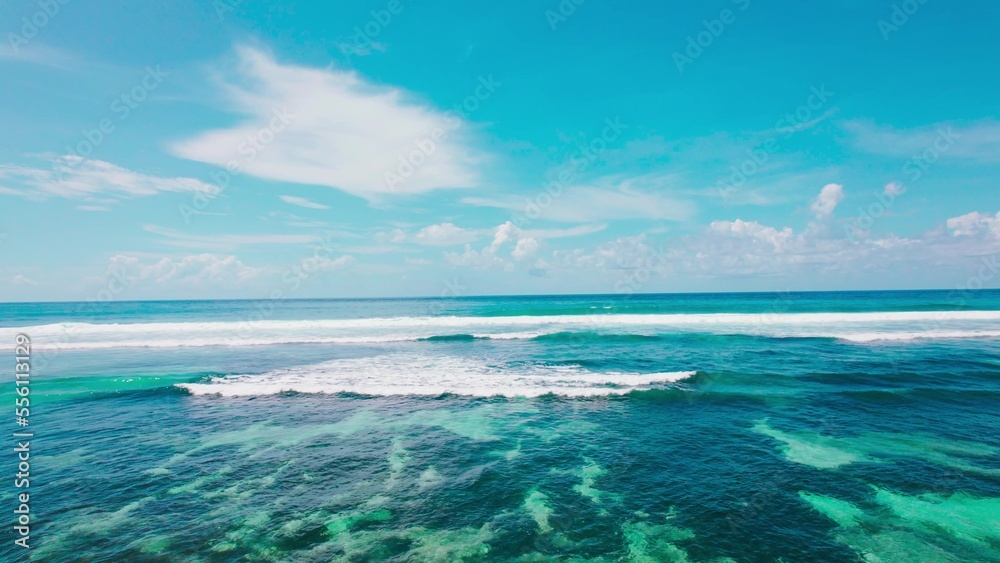 panoramic view on the Indian Ocean, beautiful landscape, aerial view on clear turquoise water and waves , Bali Indonesia