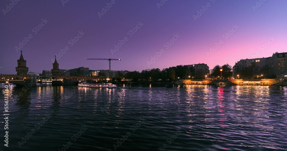 sunset panoramic view of the bridge The Oberbaum Bridge and the River Spree embankment, beautiful view on seafront, Berlin Germany