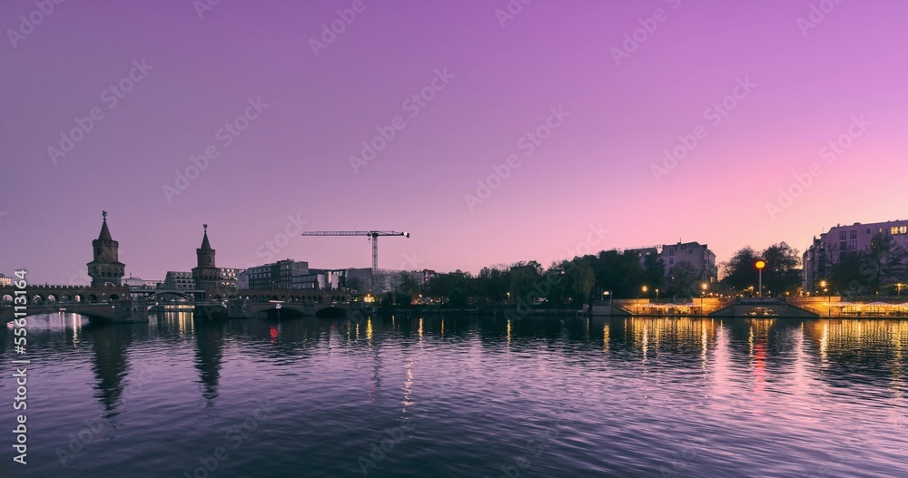 sunset sky panoramic view of the bridge The Oberbaum Bridge and the River Spree embankment, beautiful view on seafront, Berlin Germany