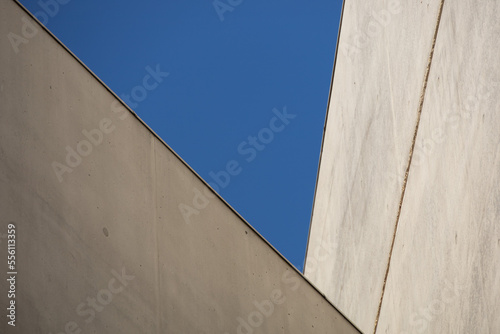 Modern architecture, concrete walls with blue sky - geometric shape