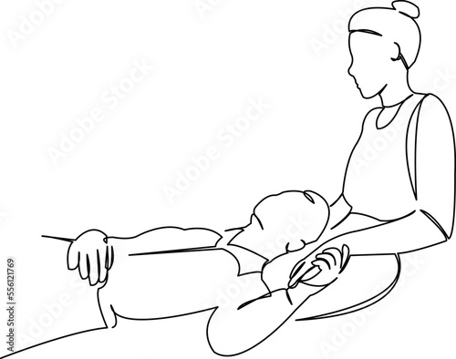 man lying on woman's lap
