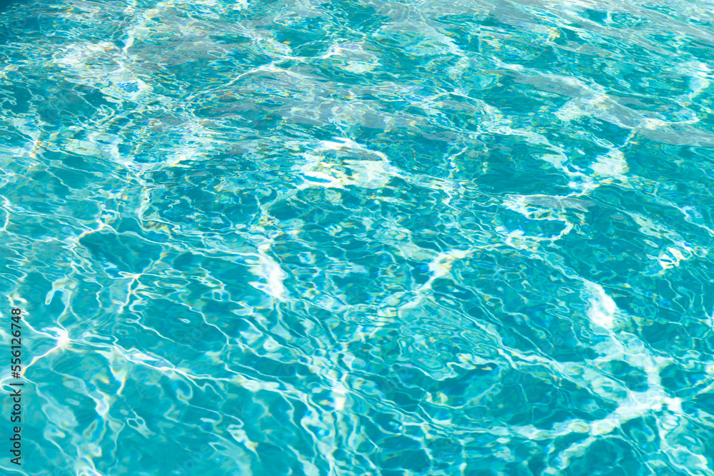 turquoise color background of swimming pool water with ripples in miami