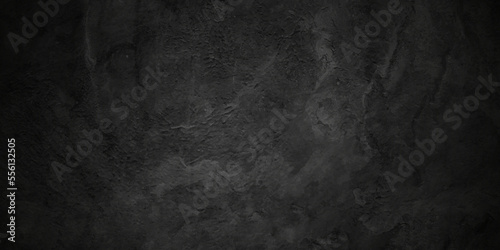 Dark black and white stone concrete grunge wall texture and backdrop background anthracite panorama. Panorama dark black or black slate background or texture.