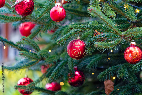 Christmas tree with Christmas lights and red and golden Christmas baubles decoration at City of Z  rich on Christmas Eve. Photo taken December 24th  2022  Zurich  Switzerland.