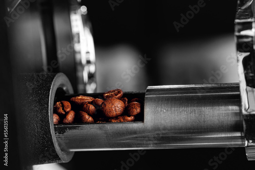 Roasting process, test probe of fresh roasted coffee beans on professional mixing roaster machines
