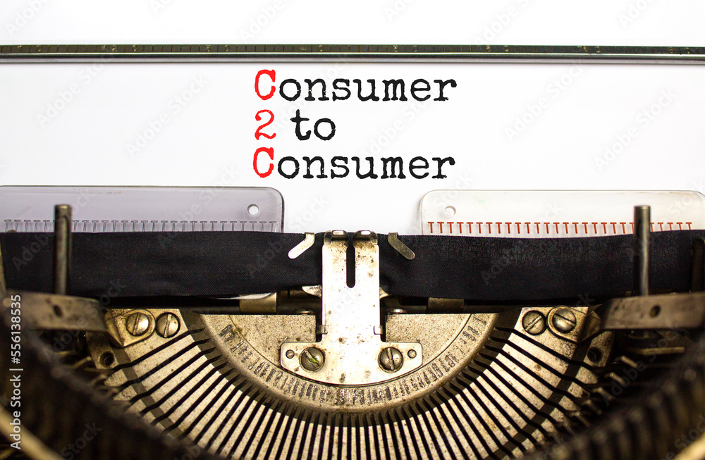 C2C consumer to consumer symbol. Concept words C2C consumer to consumer typed on old retro typewriter. Beautiful white background. Business and C2C consumer to consumer concept. Copy space.