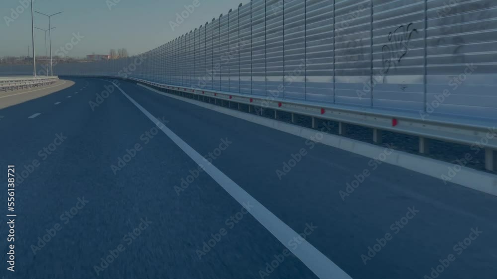 Highway Protective screens on the road. Camera rides along the protective screen of the road