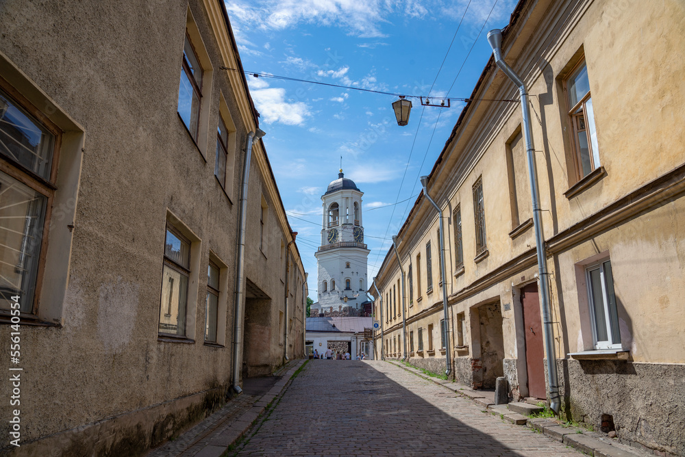 View of the ancient Clock Tower from Vodnaya Zastava Street. Vyborg, Russia