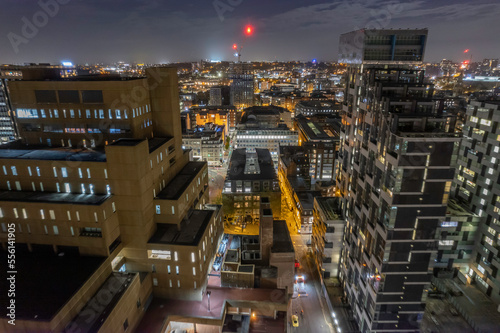 Aerial View between buildings of the Liverpool skyline at night
