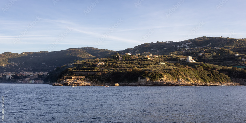 Rocky Coast and Homes near Touristic Town, Sorrento, Italy. Amalfi Coast. Sunny Evening