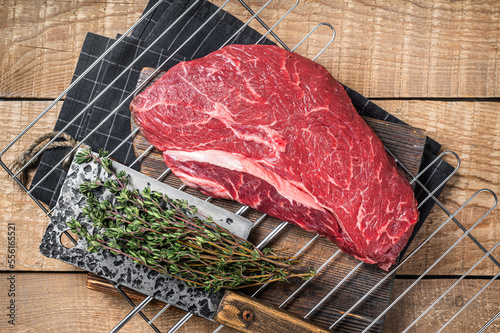 Canvas Print Ready for cooking raw top sirloin beef meat steak on a grill, or rump steak