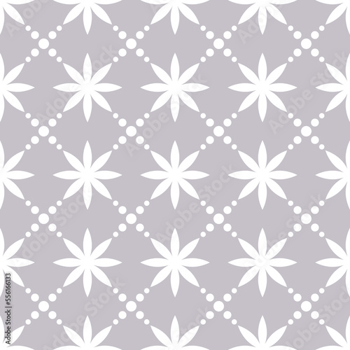 Soft seamless pattern with abstract flowers and dots.