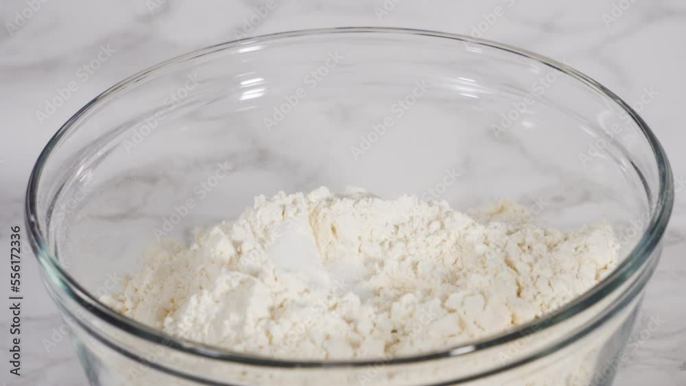 Step by step. Mixing ingredients into the batter for lemon pound cake. Step by step. Mixing ingredients into the batter for lemon pound cake.