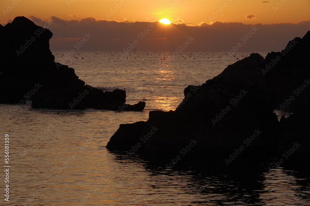 Sunrise landscape photo of a rocky beach Sunrise landscape photo of a rocky beach