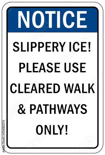 Ice warning sign and labels slippery ice please use cleared walk and pathways only