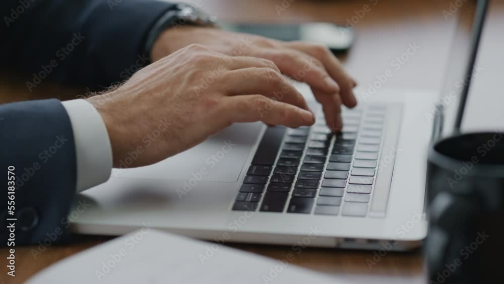 Man hands typing laptop keyboard at desk close up. Businessman using computer. Man hands typing laptop keyboard at desk close up. Businessman using computer.