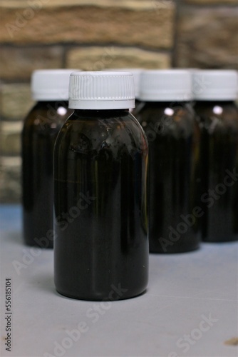 bottle with syrup for children from temperature