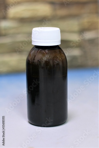bottle with syrup for children from temperature
