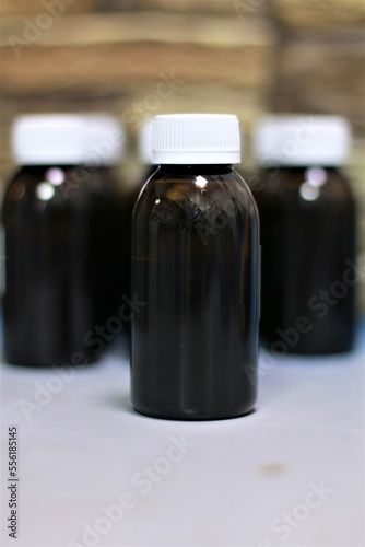 bottle with syrup for children from temperature
