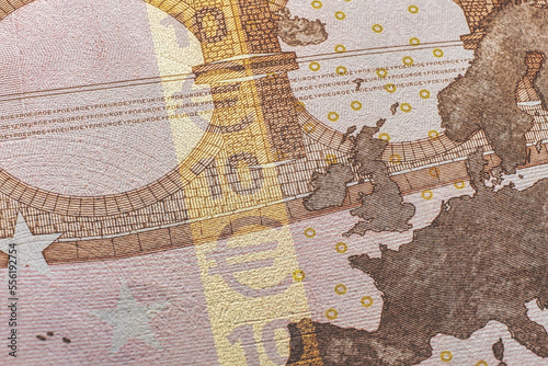 closeup of a European currency seal, with a hologram and various other security features visible. The seal is designed to be tamper-proof, making it difficult for counterfeits to be produced