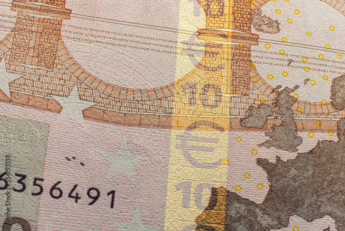 security features, the banknote a fluorescence only visible under certain lighting conditions. This helps to further protect against counterfeiting and fraud, as it is difficult to replicate