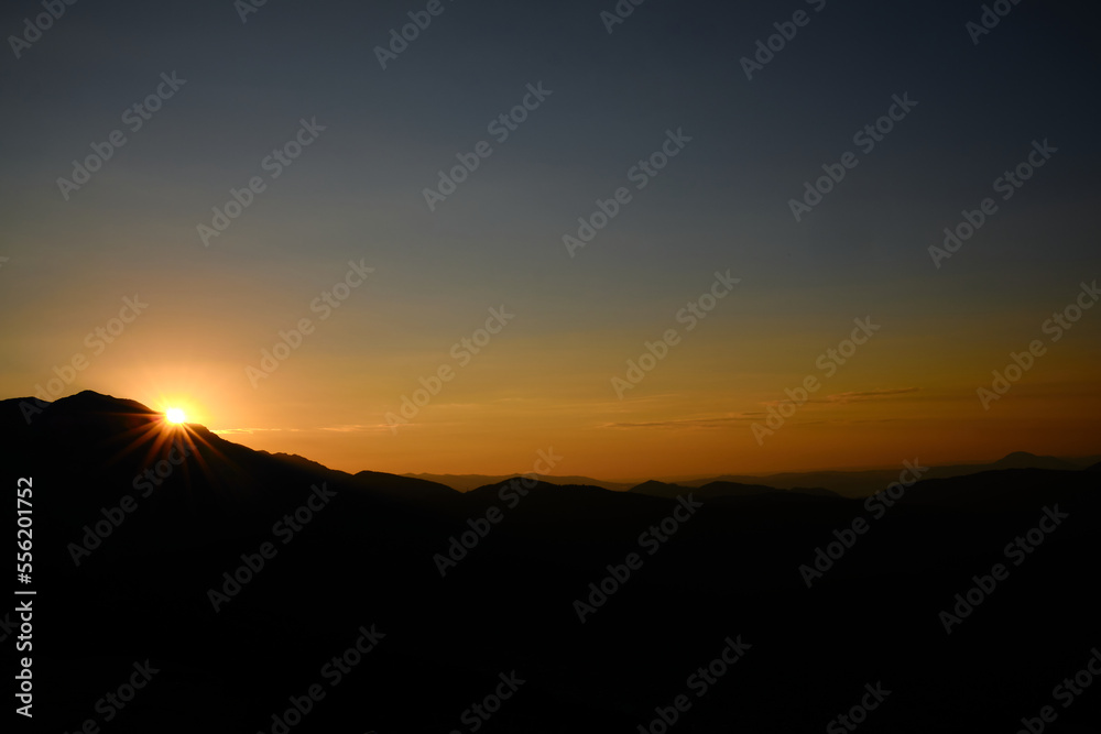sky mountain sunrise behind the clouds mountain silhouette sky mountain sunrise behind the clouds mountain silhouette