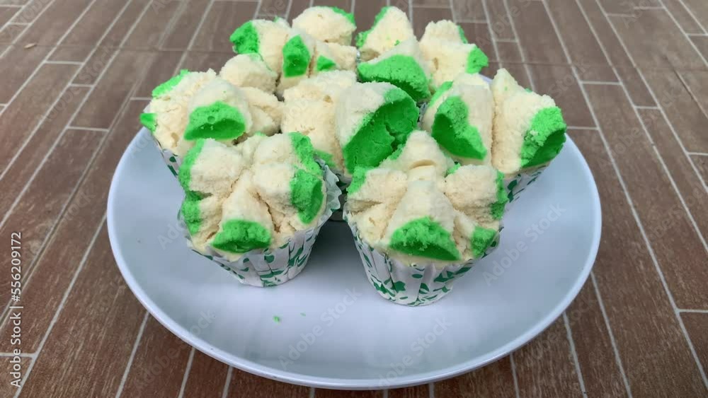 bolu kukus is an Indonesian traditional snack of steamed sponge cupcake bolu kukus is an Indonesian traditional snack of steamed sponge cupcake