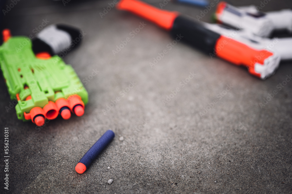 Soft foam dart gun loaded and ready for use by children. Soft foam dart gun loaded and ready for use by children.
