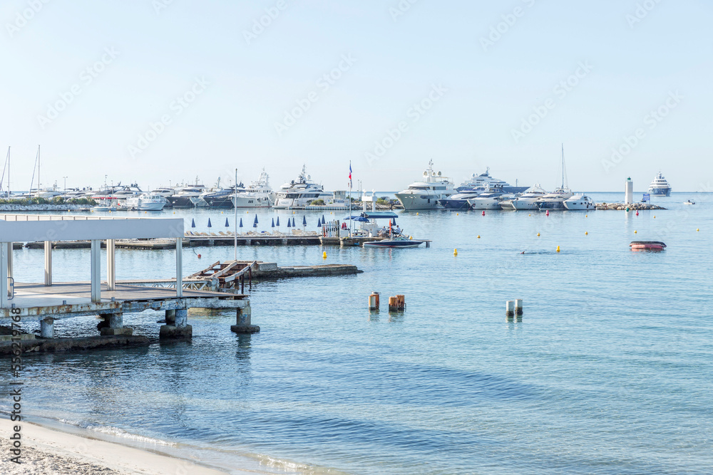 Yachts in the marina in the mediterranean. Active rest and relaxation. Beautiful landscape on a sunny day in a resort.