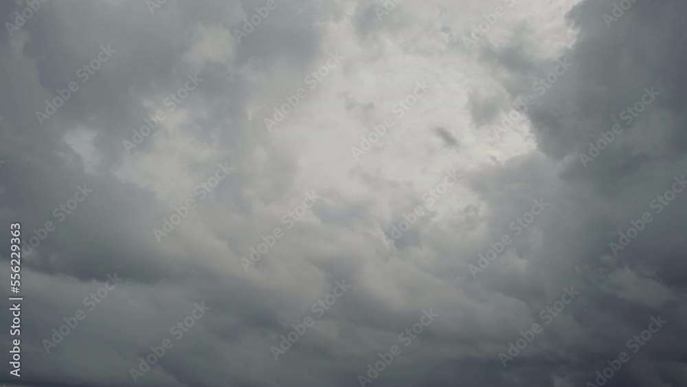Gray clouds sweep quickly across the sky in anticipation of a thunderstorm Gray clouds sweep quickly across the sky in anticipation of a thunderstorm