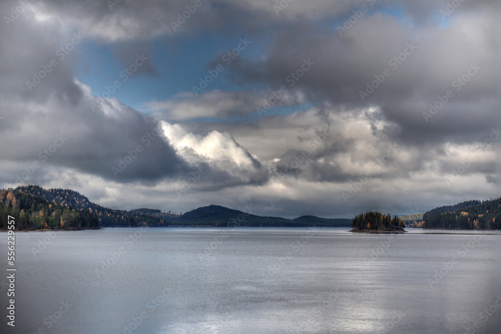 Dramatic clouds over Swedish lake in Lapland