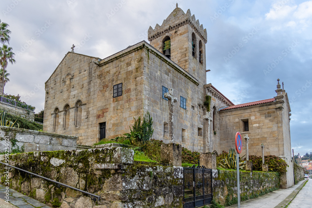 Baiona, Spain - December 05, 2022: collegiate church santa maria de baiona, medieval building in the town of Baiona, Spain