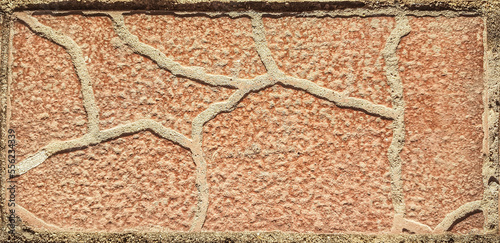close-up . original sidewalk pavement with decorative tile