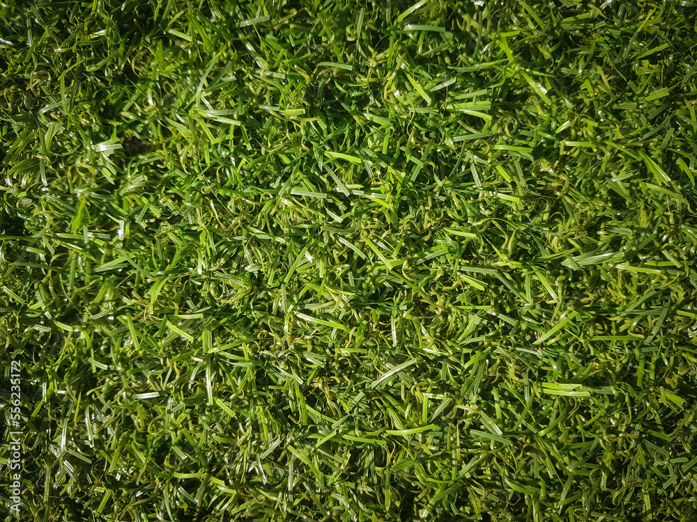 close up. background of artificial green grass. close up. background of artificial green grass.
