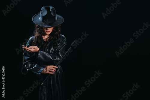 Bilde på lerret Sexy female dominant mistress with whip flogger and handcuffs for BDSM sex with