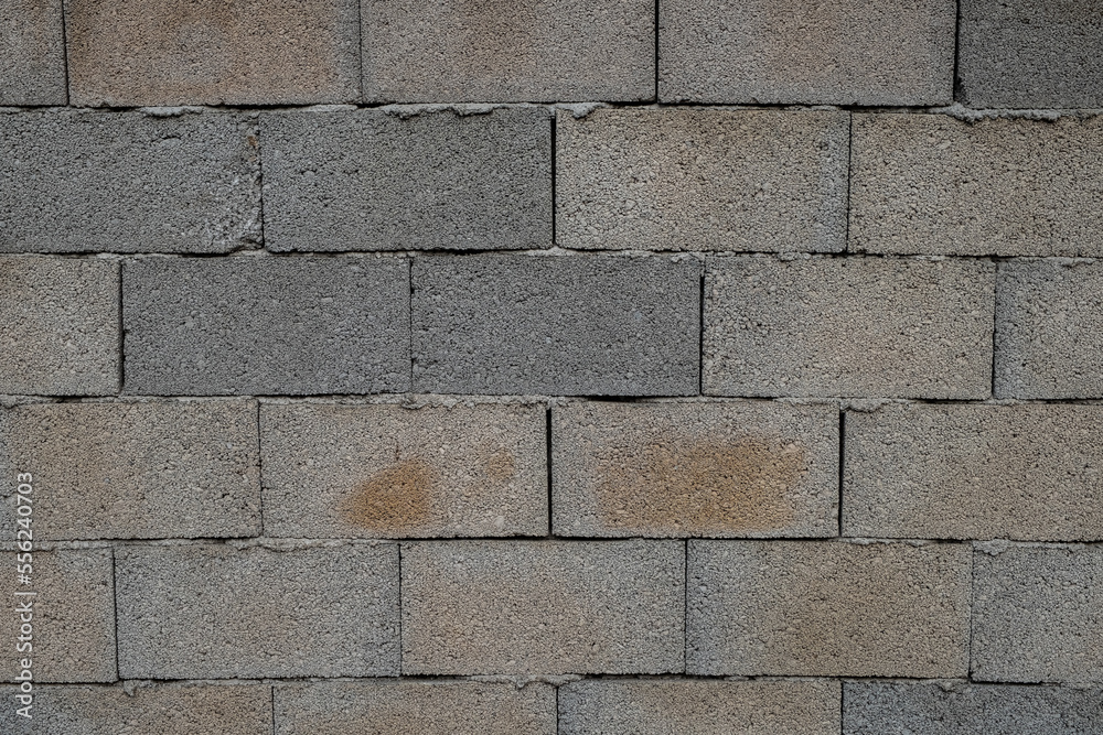 Obraz premium Background of old vintage dirty brick wall with peeling plaster