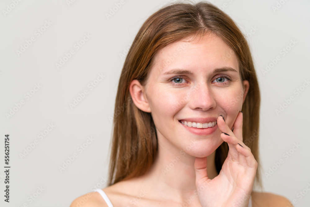 Portrait of pretty young woman over isolated white background Portrait of pretty young woman over isolated white background