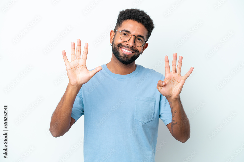 Young Brazilian man isolated on white background counting nine with fingers Young Brazilian man isolated on white background counting nine with fingers