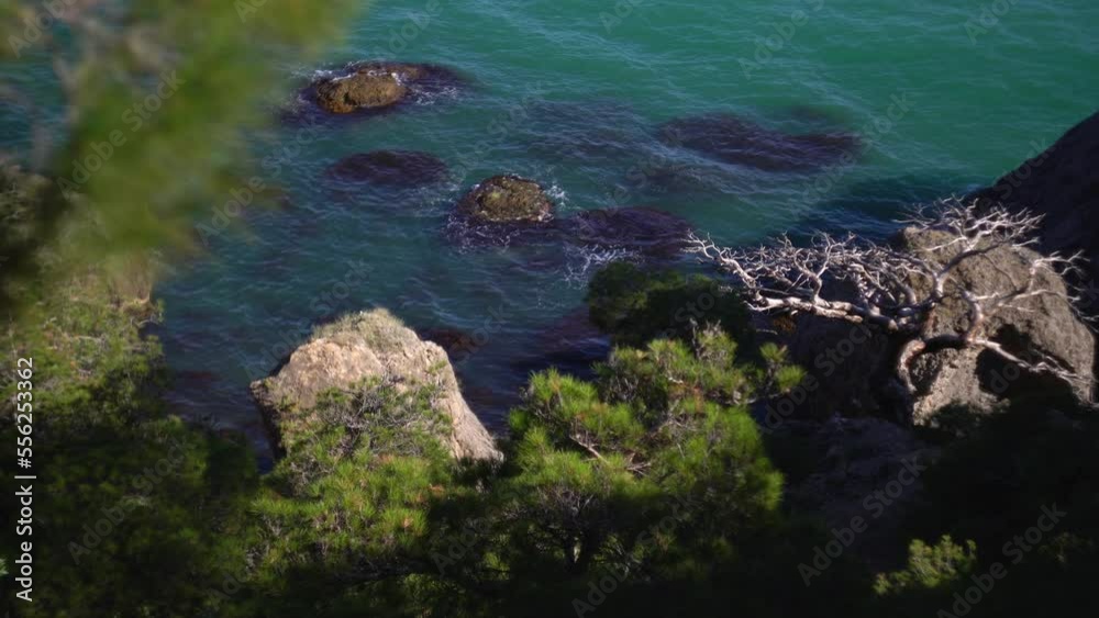 View from the top of the bay with turquoise sea colors and rocks. Crimea. New World. View from the top of the bay with turquoise sea colors and rocks. Crimea. New World.